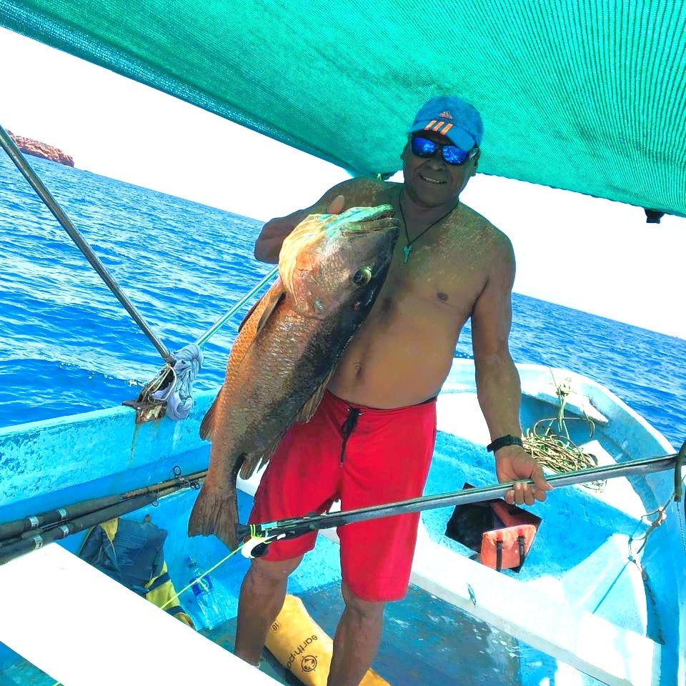 Galo holding a massive grouper